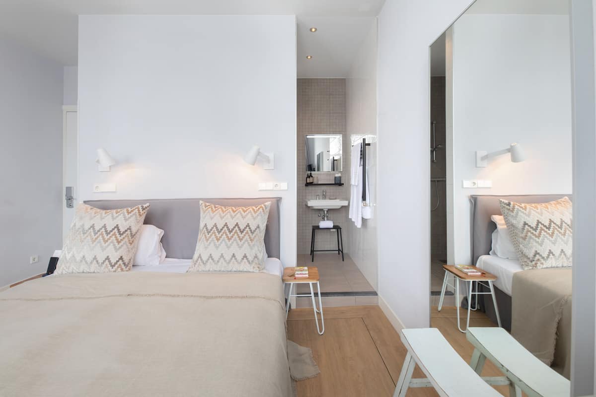 superior double room (patio side) | hypo-allergenic bedding, minibar, in-room safe, individually decorated