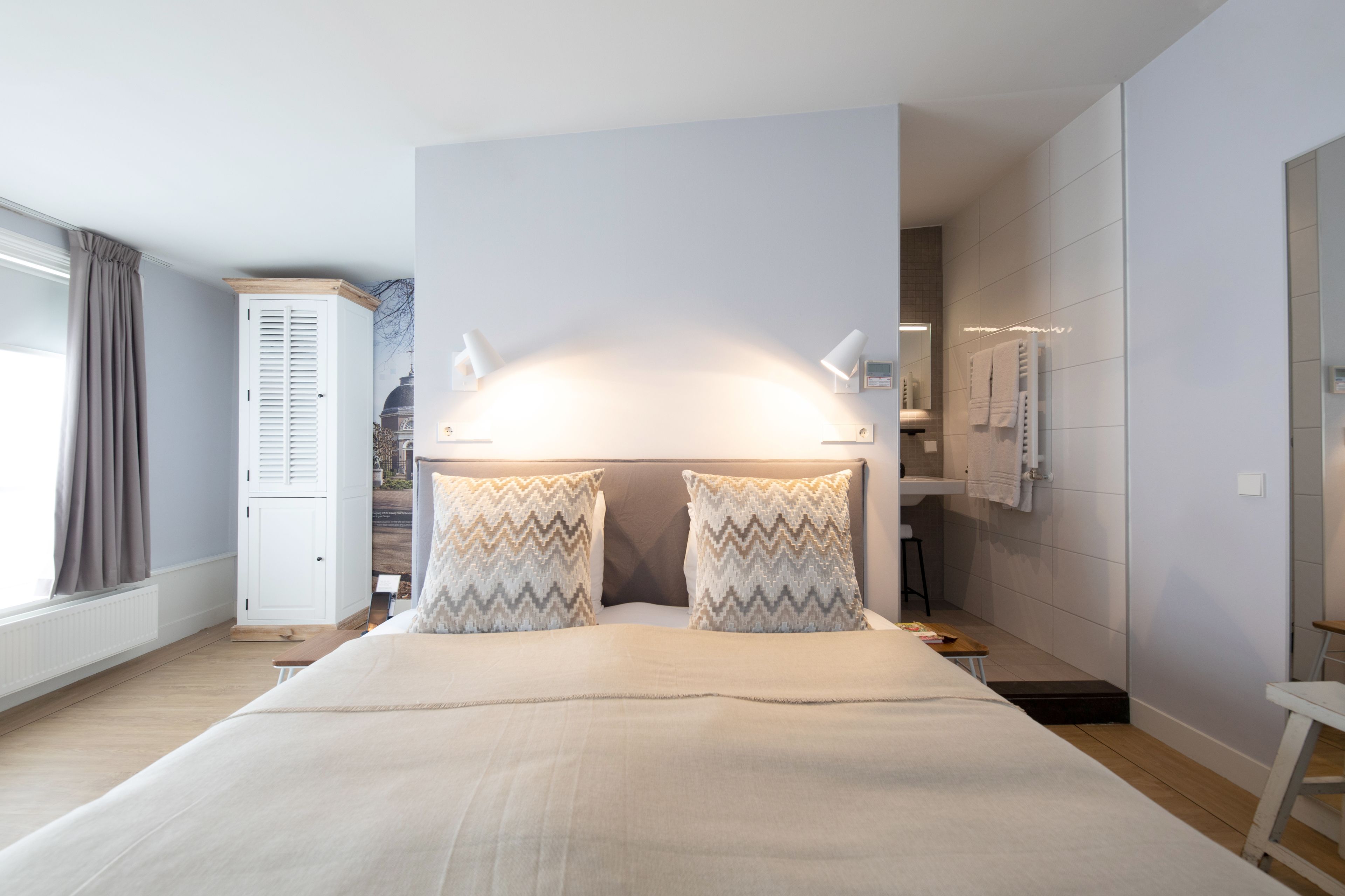 deluxe double room | hypo-allergenic bedding, minibar, in-room safe, individually decorated