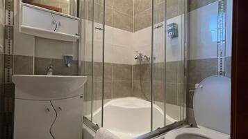 Shower, free toiletries, hair dryer, towels