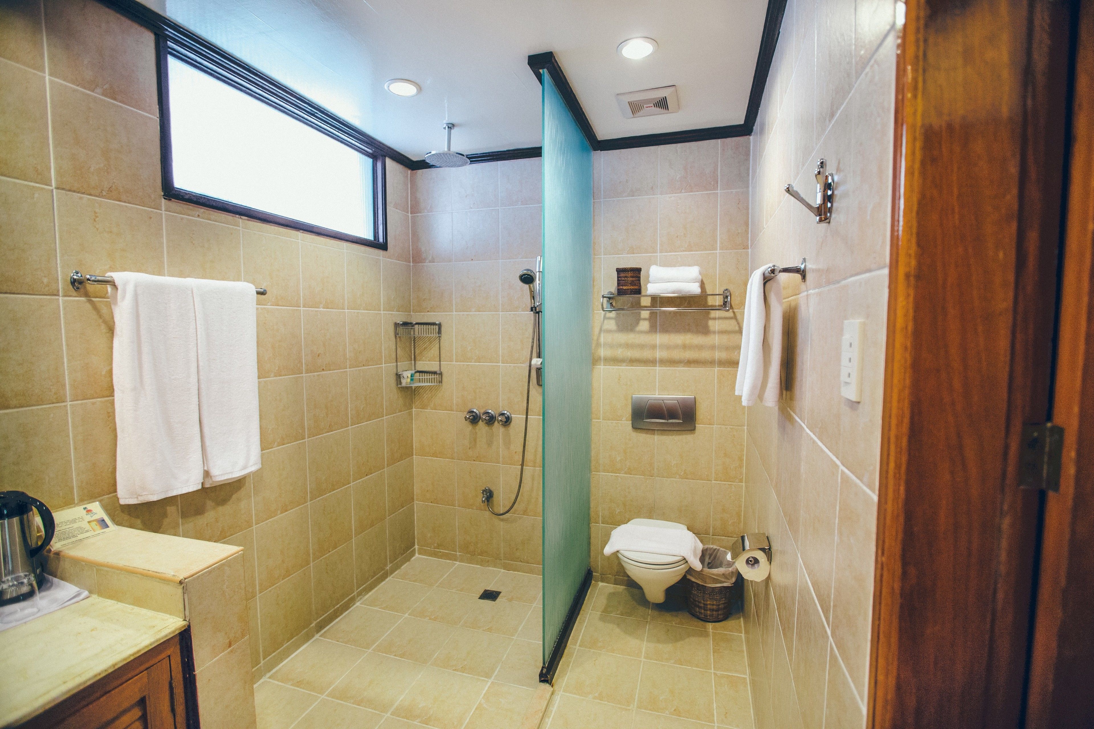 shower, free toiletries, slippers, towels