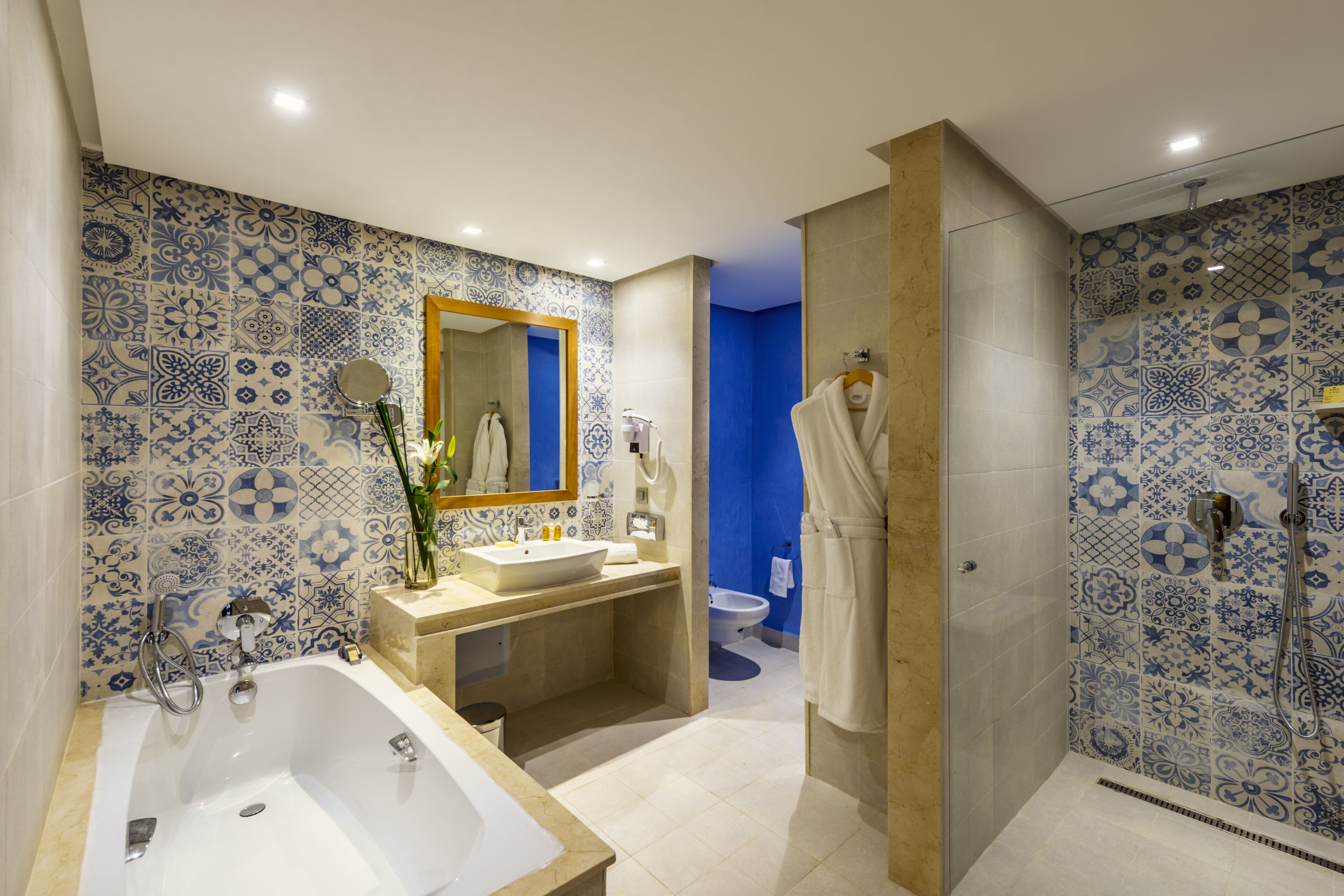 free toiletries, hair dryer, slippers, bidet