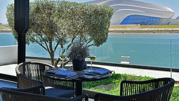 Breakfast, lunch, dinner served; Mediterranean cuisine, pool views