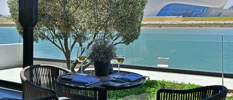 Breakfast, lunch, dinner served; Mediterranean cuisine, pool views
