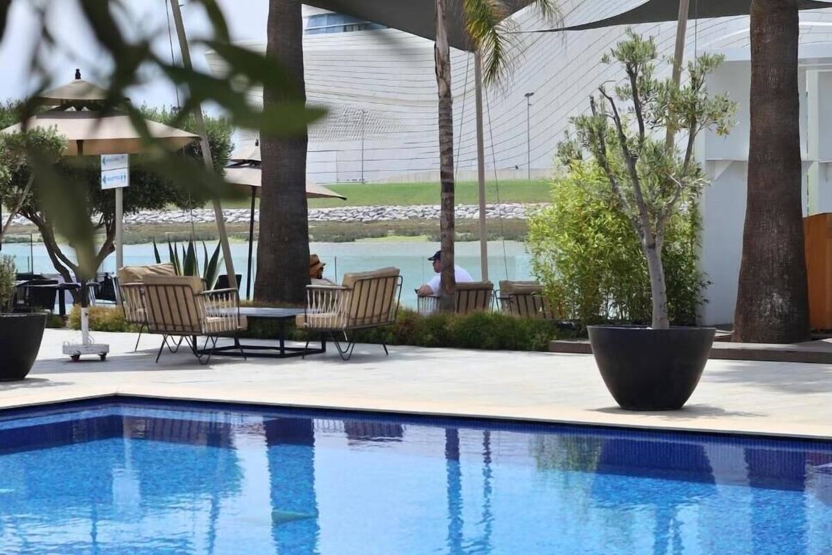 premium room (river view) | 1 bedroom, minibar, in-room safe, individually decorated