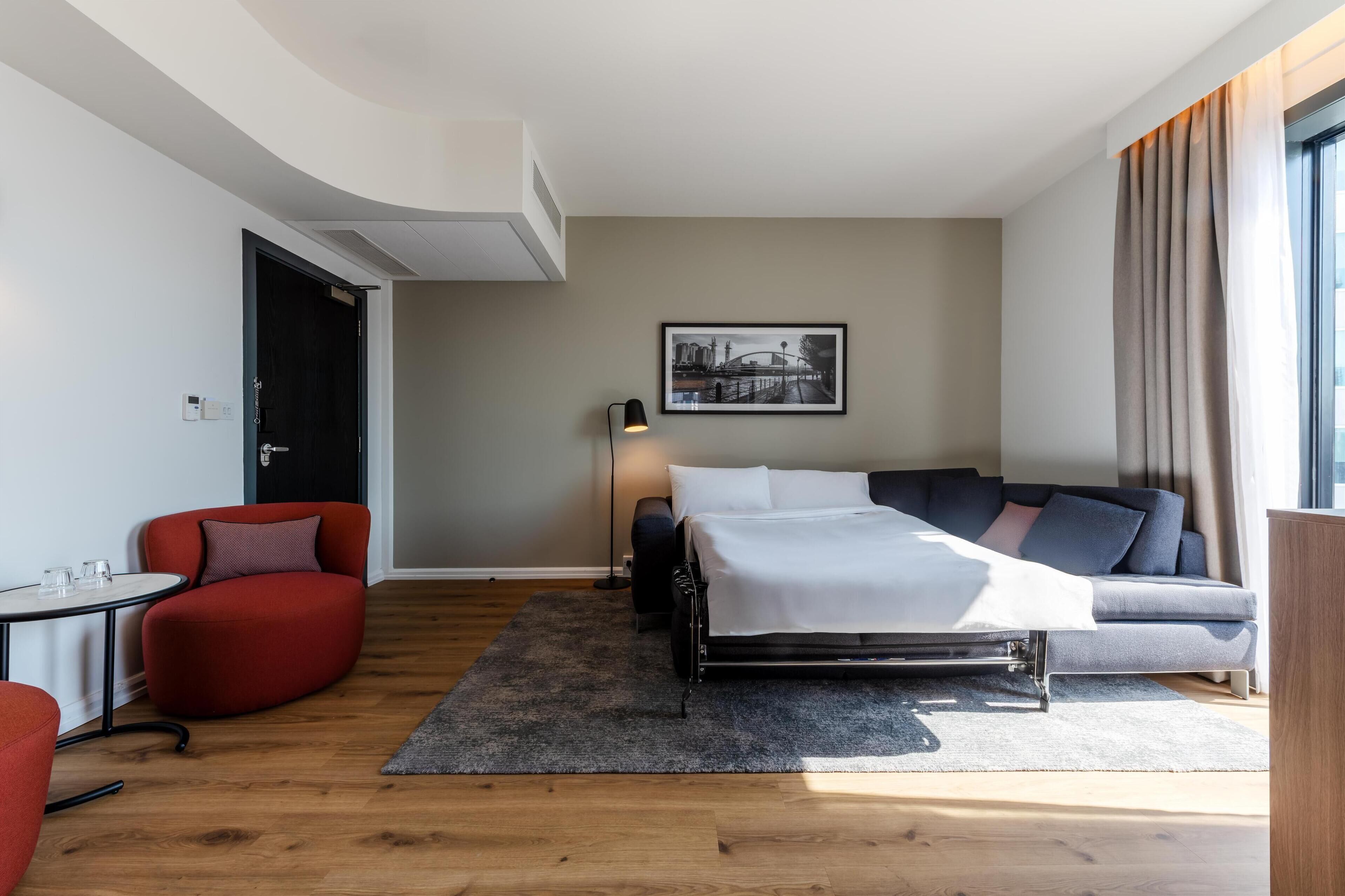 suite, 1 bedroom (net zero) | hypo-allergenic bedding, in-room safe, desk, iron/ironing board