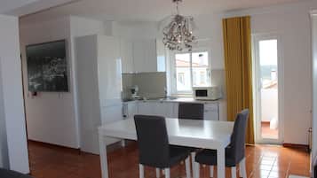 Panoramic Suite, 1 Bedroom, Sea View | Living area | Flat-screen TV