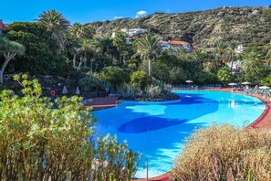 Outdoor pool, pool umbrellas, pool loungers