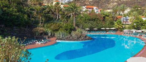 Outdoor pool, pool umbrellas, pool loungers