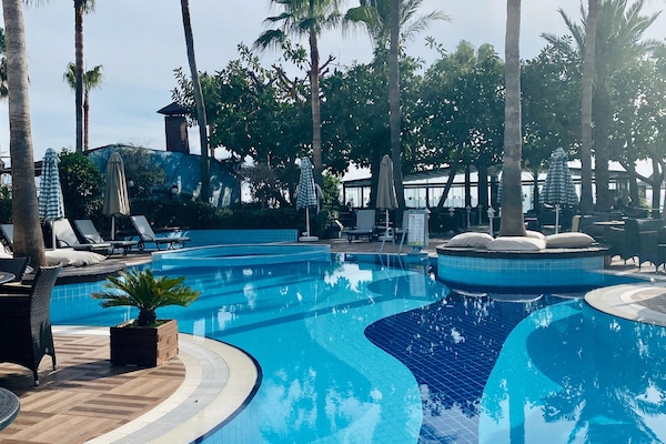 Seasonal outdoor pool, pool umbrellas, sun loungers