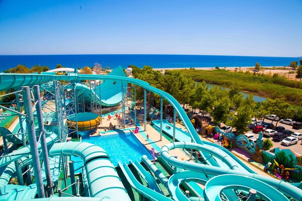 Indoor pool, 2 outdoor pools, open 8:00 AM to 6:00 PM, pool umbrellas