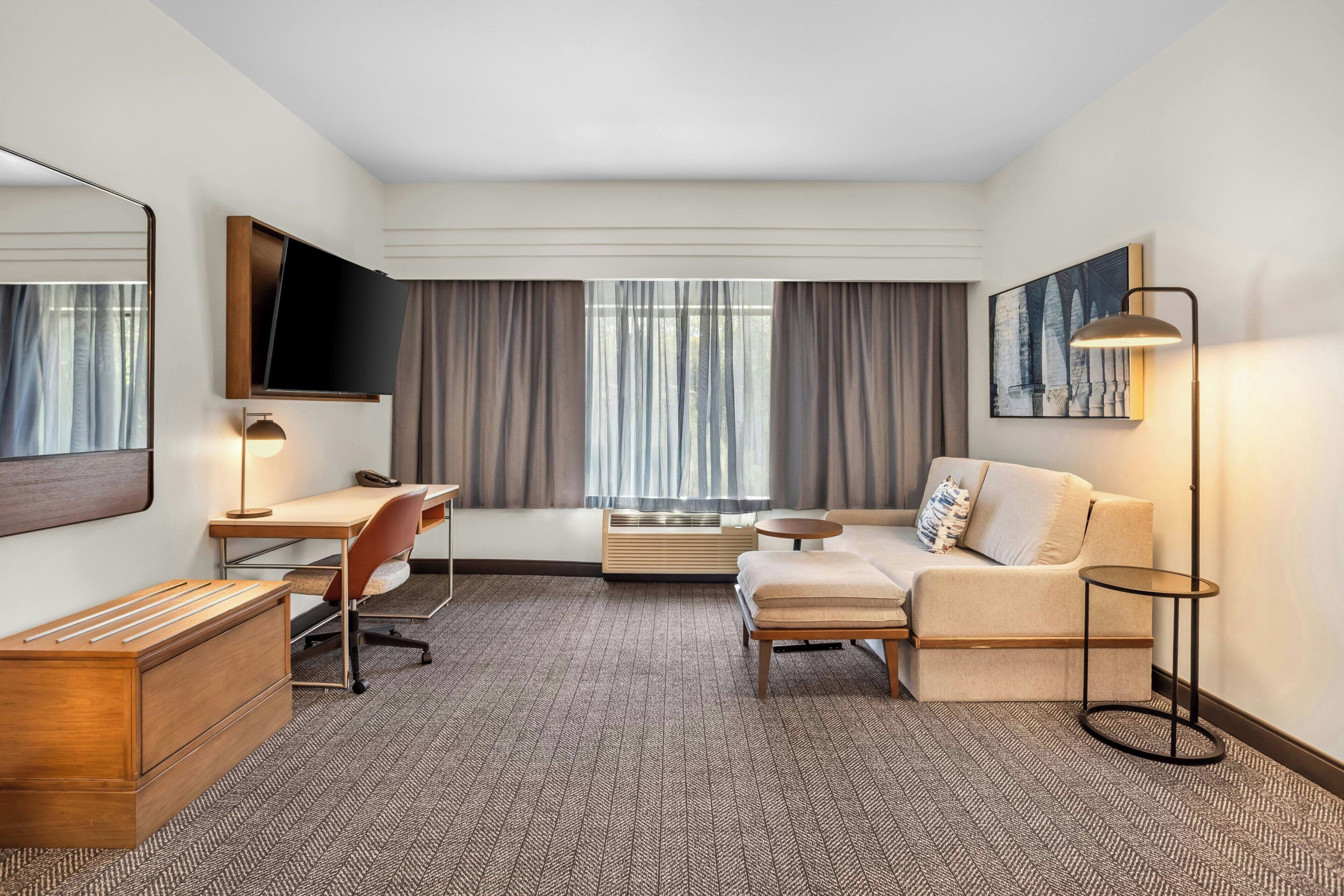 Suite, 1 Bedroom, Roll-in Shower | Living area | 32-inch LCD TV with satellite channels, TV