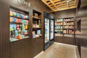 A store with shelves stocked with various products including snacks, beverages, and household items. - Courtyard by Marriott St Augustine I-95 (St. Augustine)