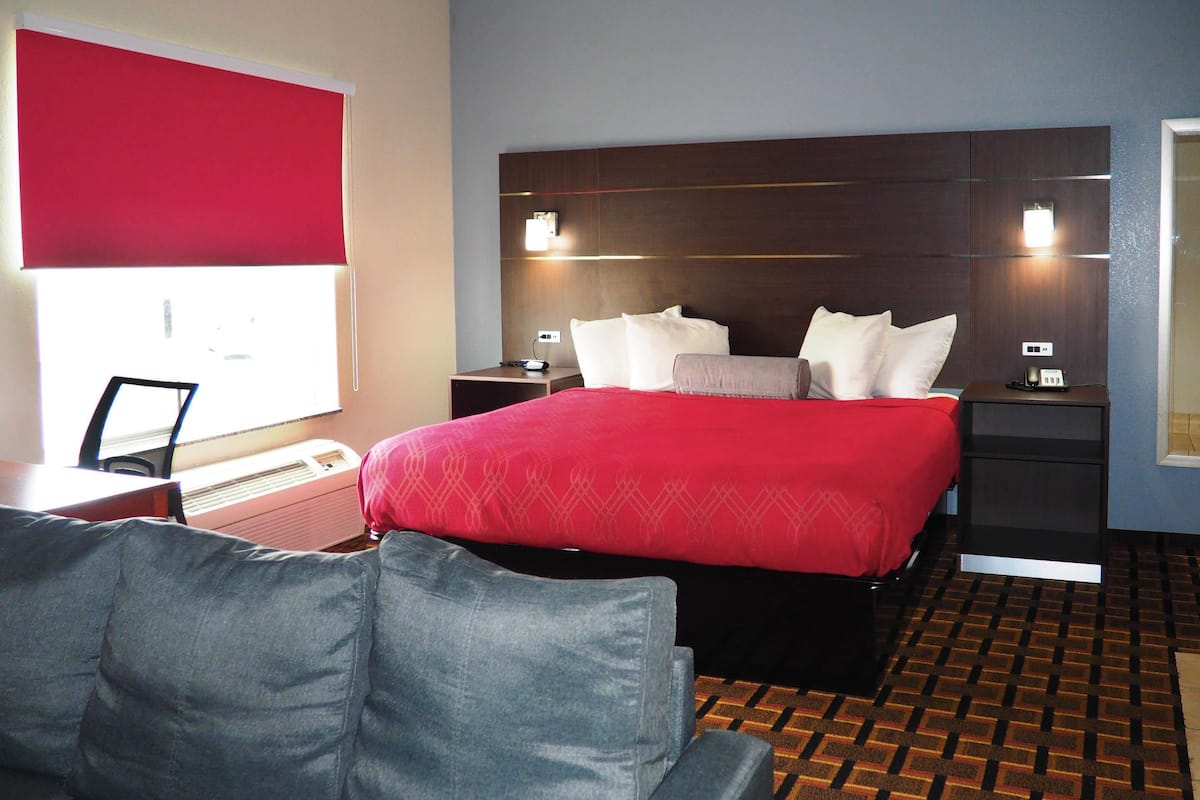 Suite, 1 King Bed, Non Smoking | Desk, laptop workspace, iron/ironing board, free cribs/infant beds