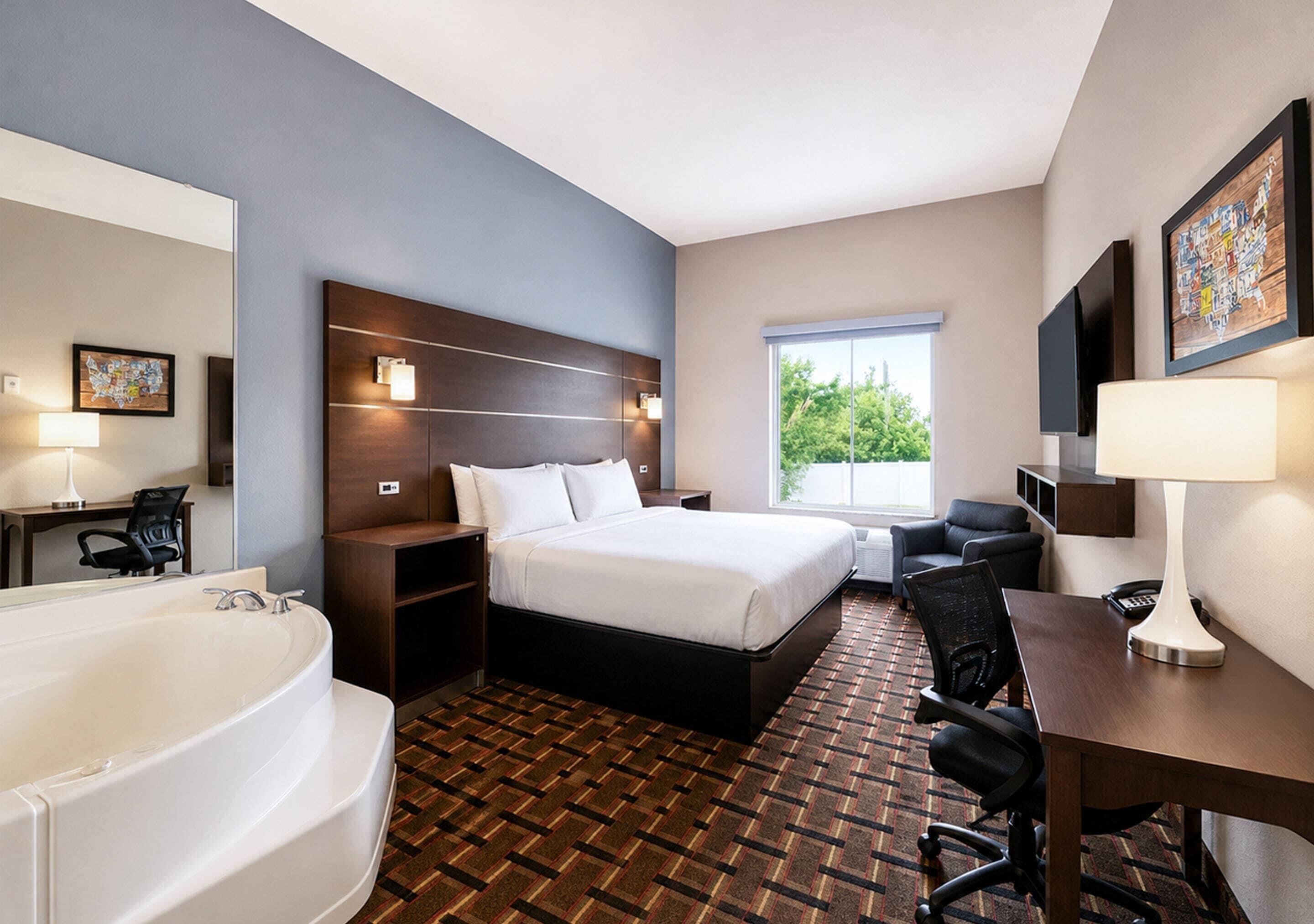 Suite, 1 King Bed, Non Smoking | Desk, laptop workspace, iron/ironing board, free cribs/infant beds