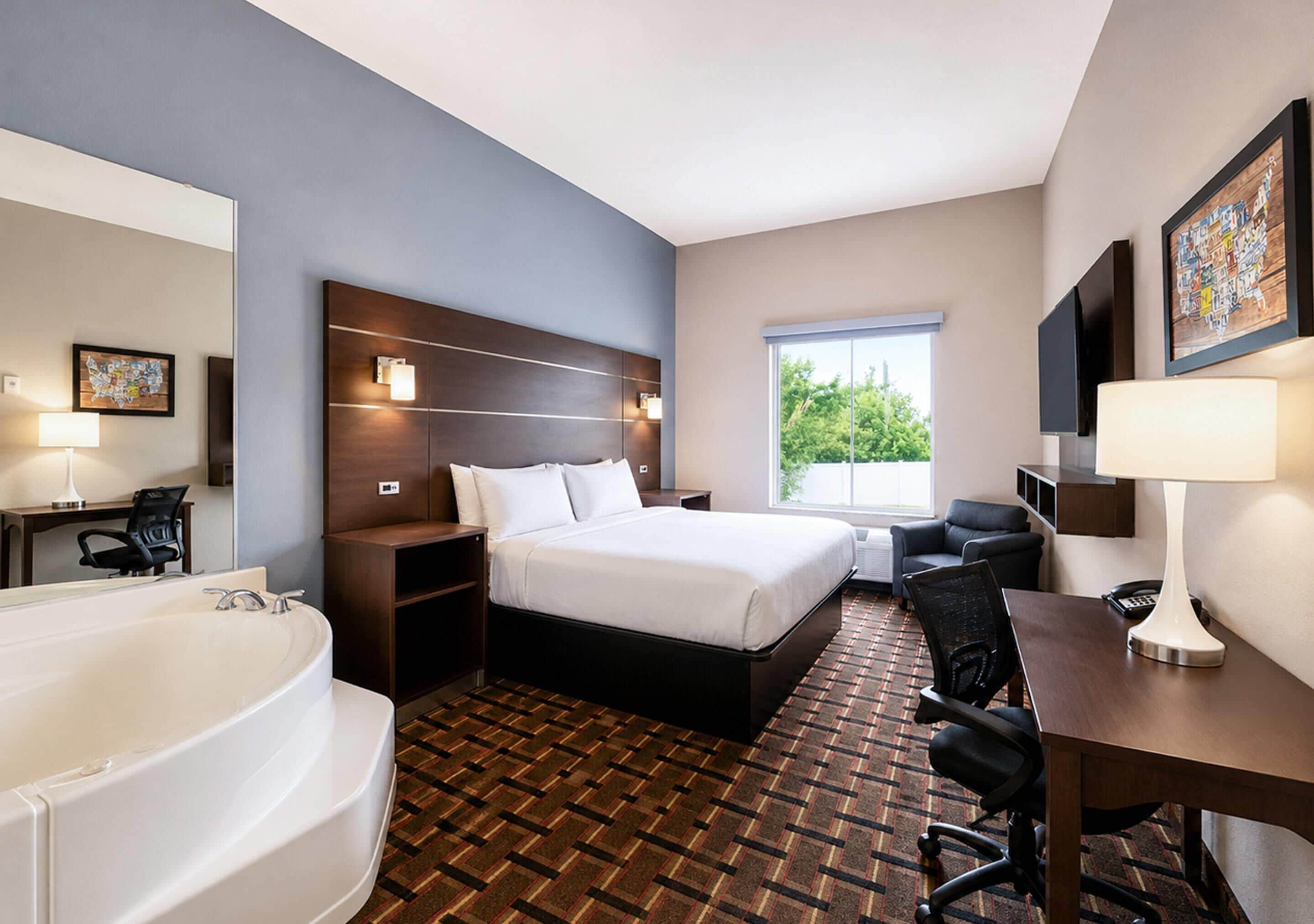 Suite, 1 King Bed, Non Smoking | Desk, laptop workspace, iron/ironing board, free cribs/infant beds