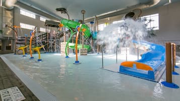 Enjoy splashing fun in our indoor water park with slides and water features.