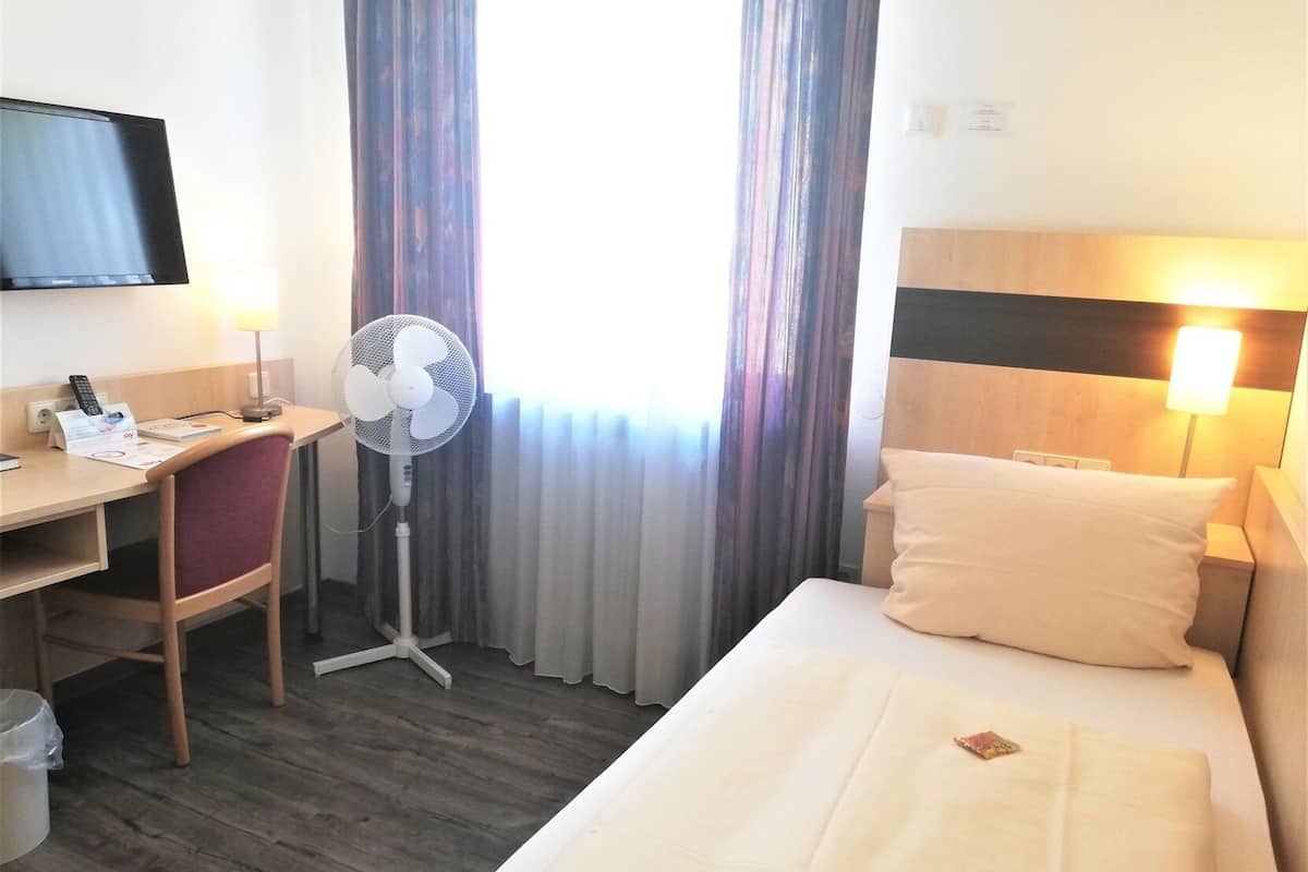Desk, cots/infant beds, rollaway beds, free WiFi