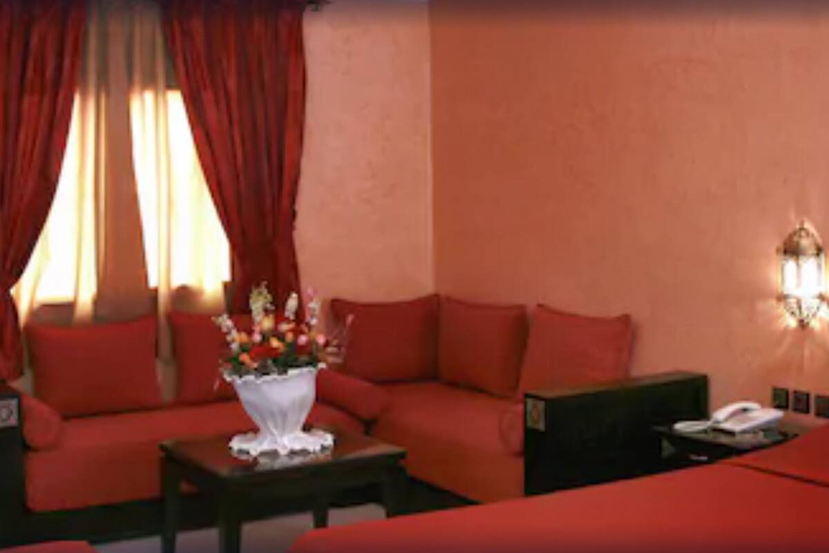 Triple Room | Living area | TV