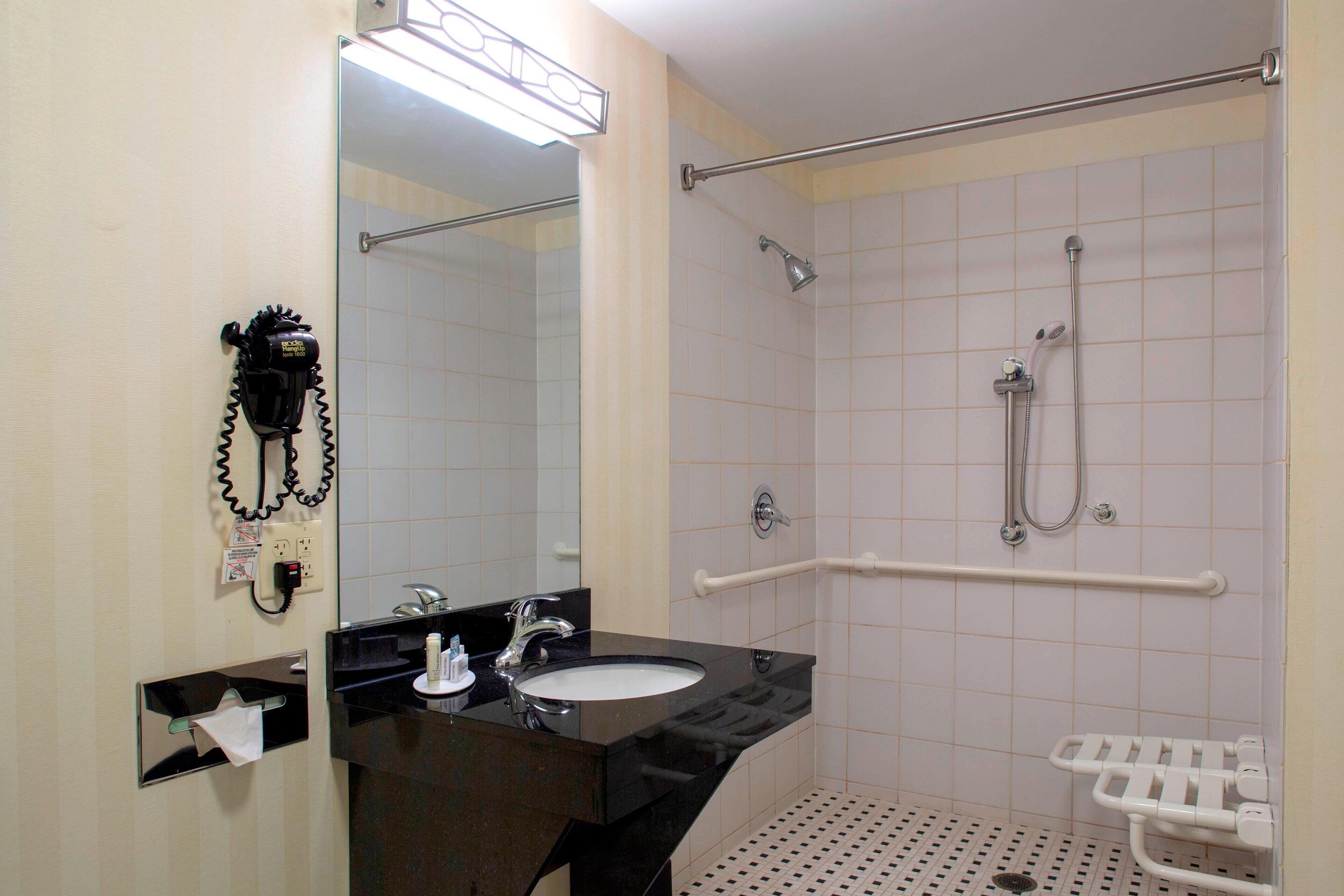 combined shower/bathtub, free toiletries, hair dryer, towels