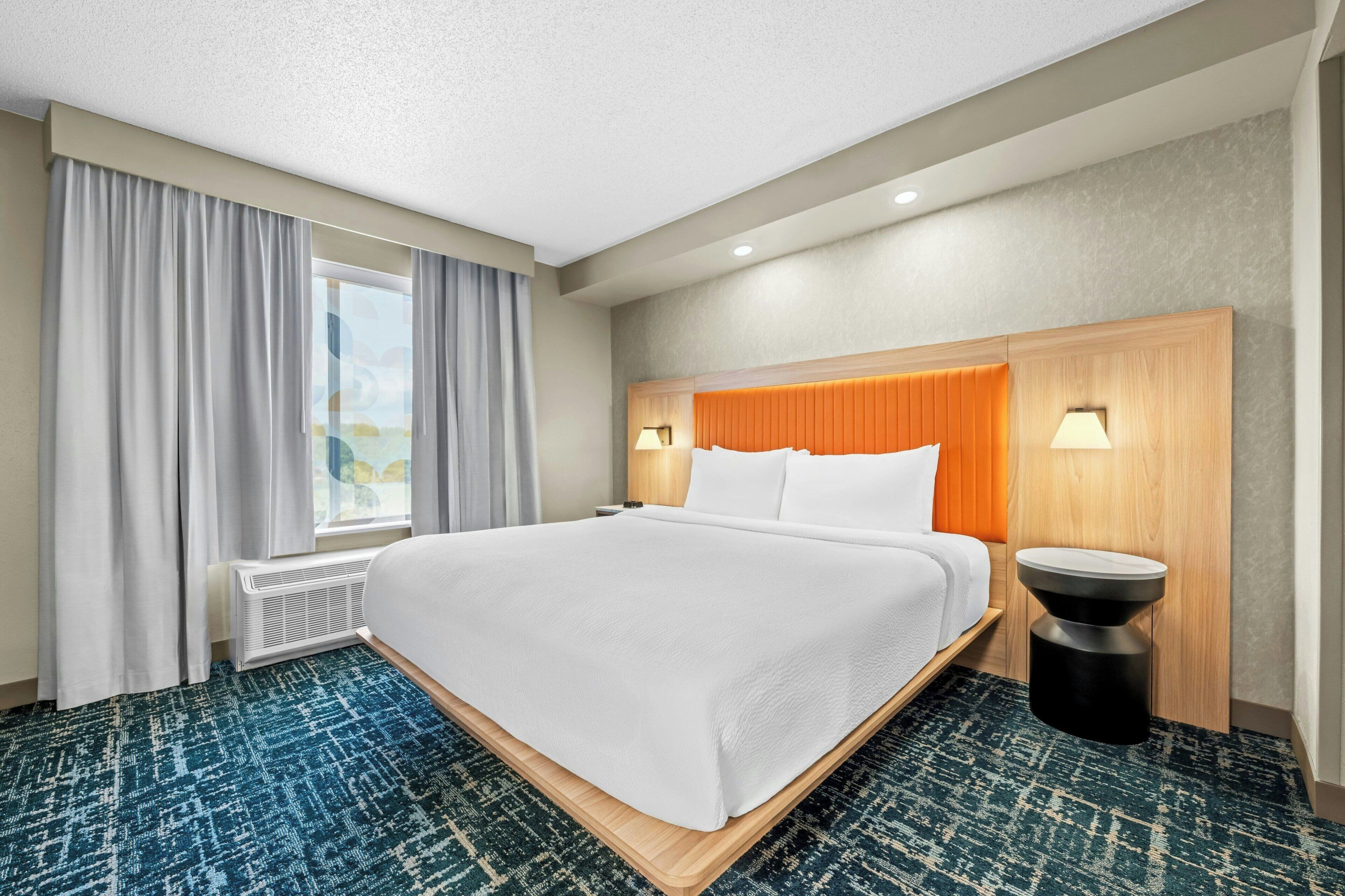 Premium bedding, memory foam beds, desk, blackout drapes
