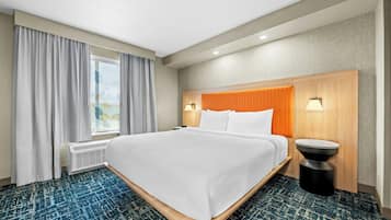 Premium bedding, memory foam beds, desk, blackout drapes