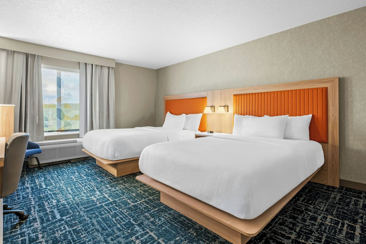 Premium bedding, memory-foam beds, desk, blackout curtains