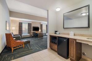 Mobility Accessible King Studio Suite | Premium bedding, desk, blackout curtains, iron/ironing board