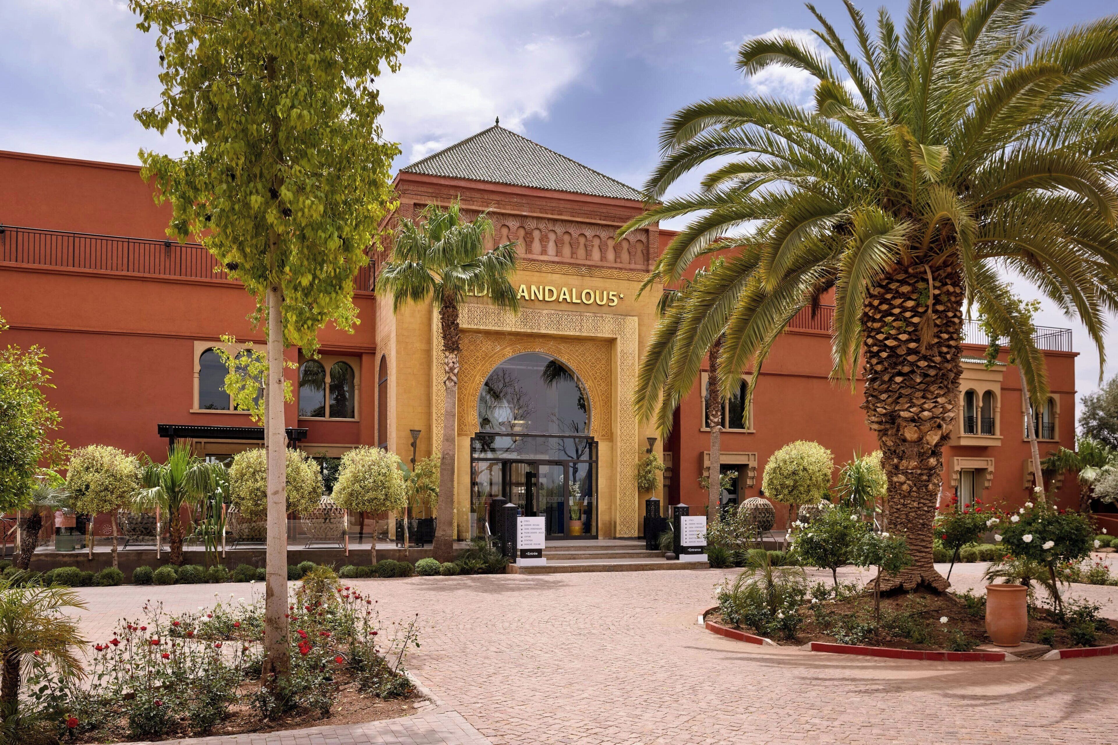 A building with an arched entrance labeled 'ANDALOUS'.