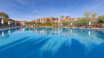 Indoor pool, 3 outdoor pools, open 9:00 AM to 6:00 PM, pool umbrellas