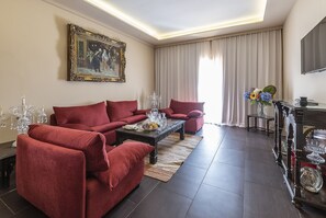 Royal Suite | Living area | 55-inch LED TV with satellite channels - Eden Andalou Aquapark & Spa (Marrakech)