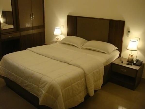 In-room safe, desk, blackout curtains, soundproofing