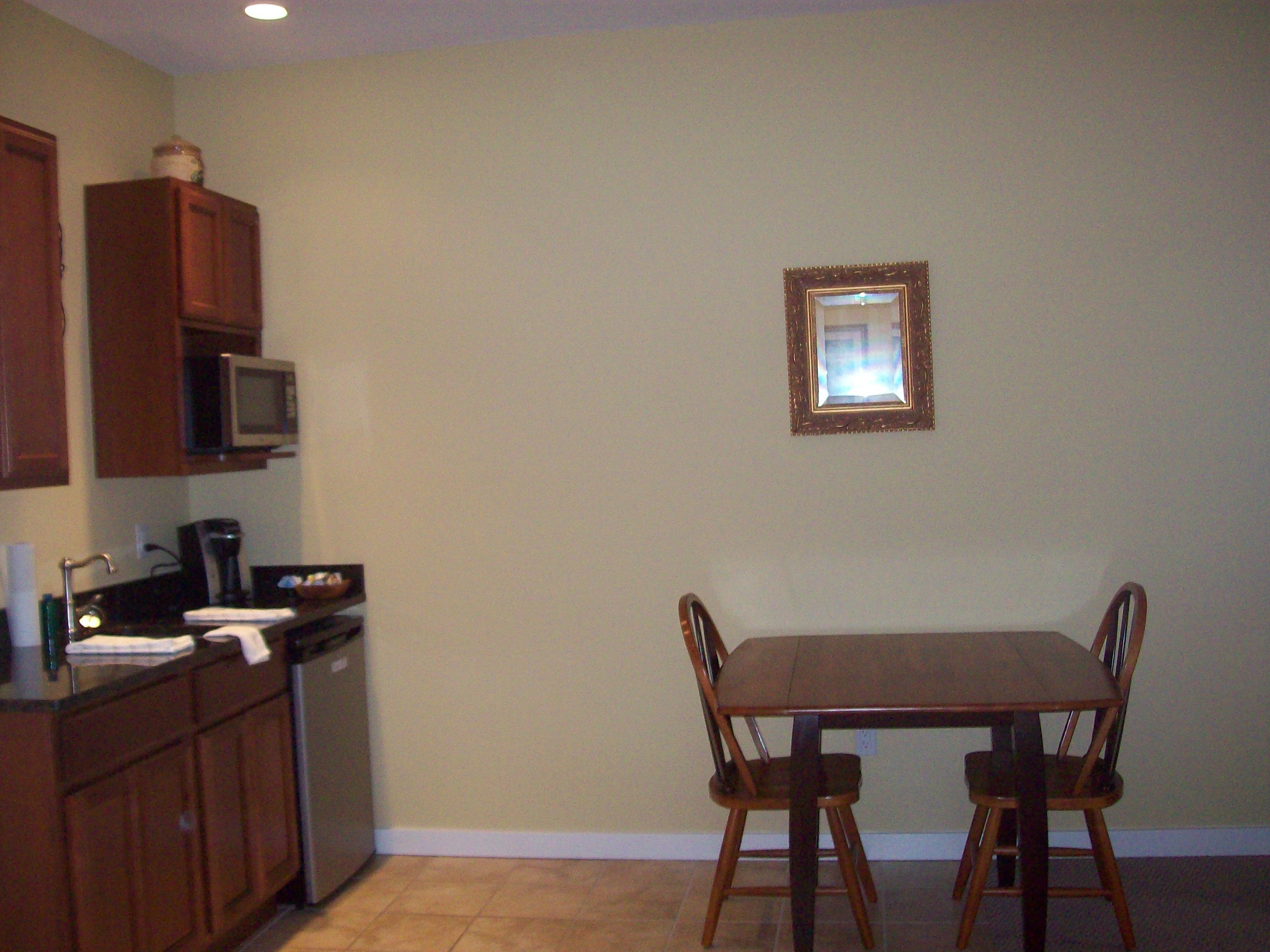 suite, 1 king bed with sofa bed, non smoking | in-room dining