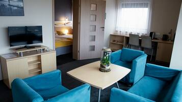 Chambre Deluxe | Coin séjour