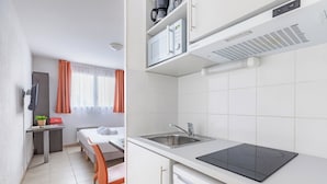 A compact kitchen with a microwave, sink, and induction cooktop. - Appart'City Classic Marseille Aéroport – Vitrolles (Vitrolles)