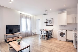 Family Apartment | Living room | 32-inch LCD TV with satellite channels, TV