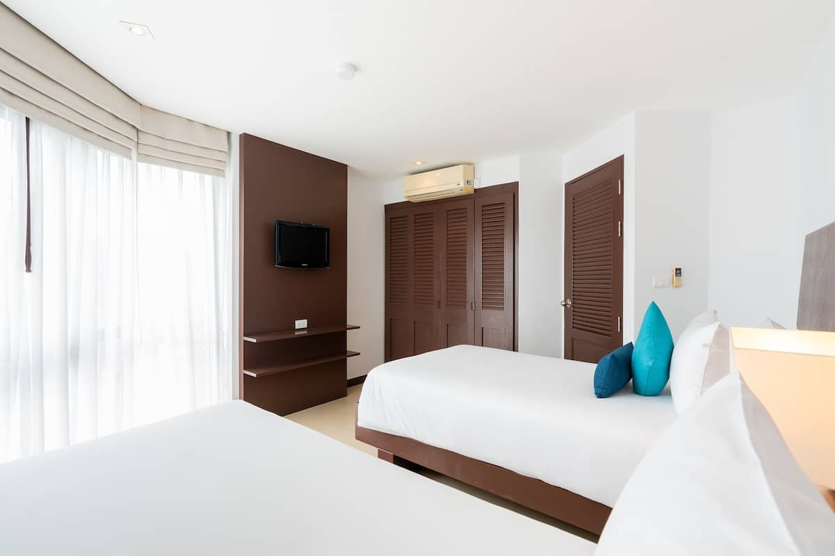 Suíte premium, 2 quartos | 1 quarto, frigobar, cofres nos quartos, individualmente decorados