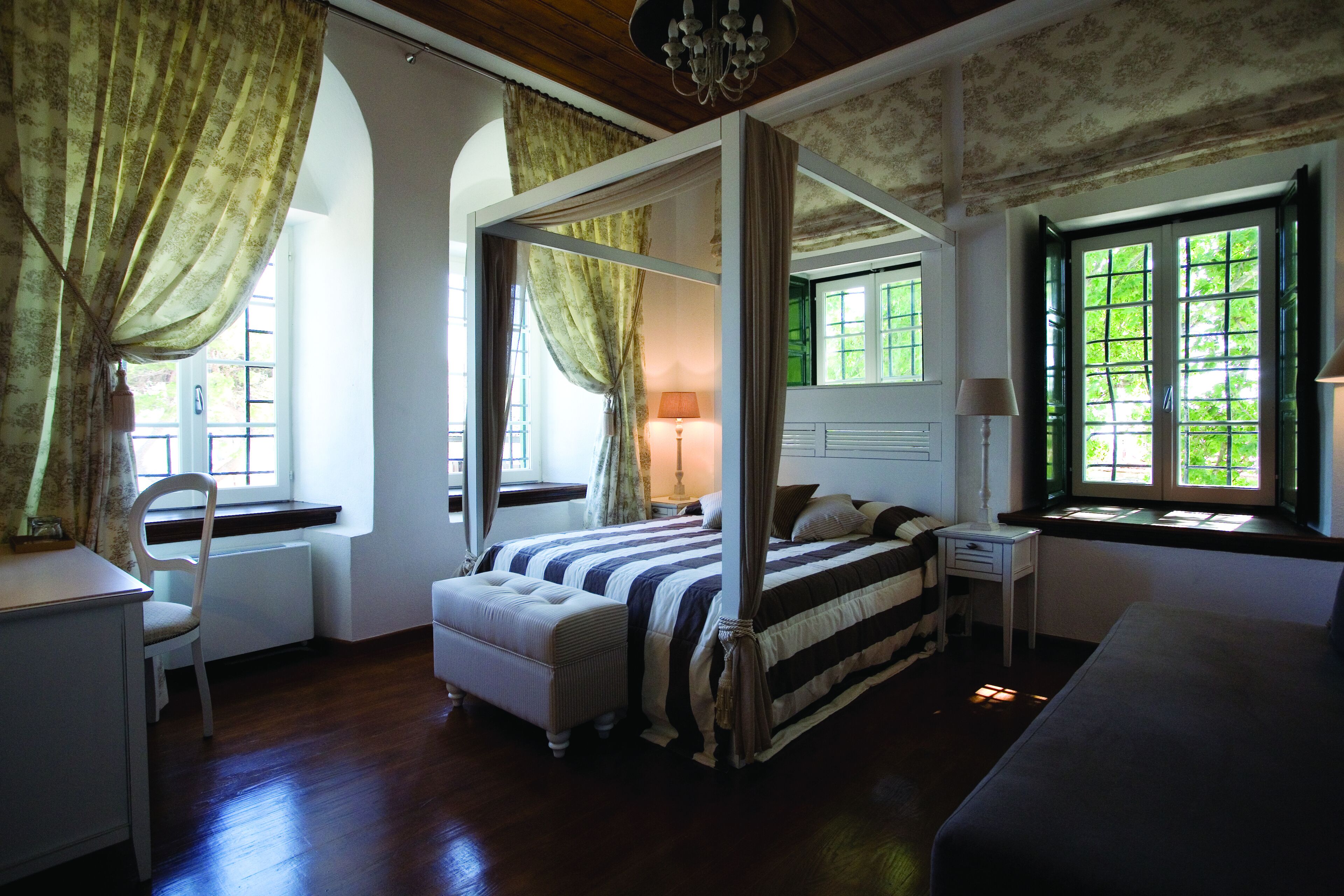 superior room, sea or pool view | minibar, in-room safe, individually decorated, desk