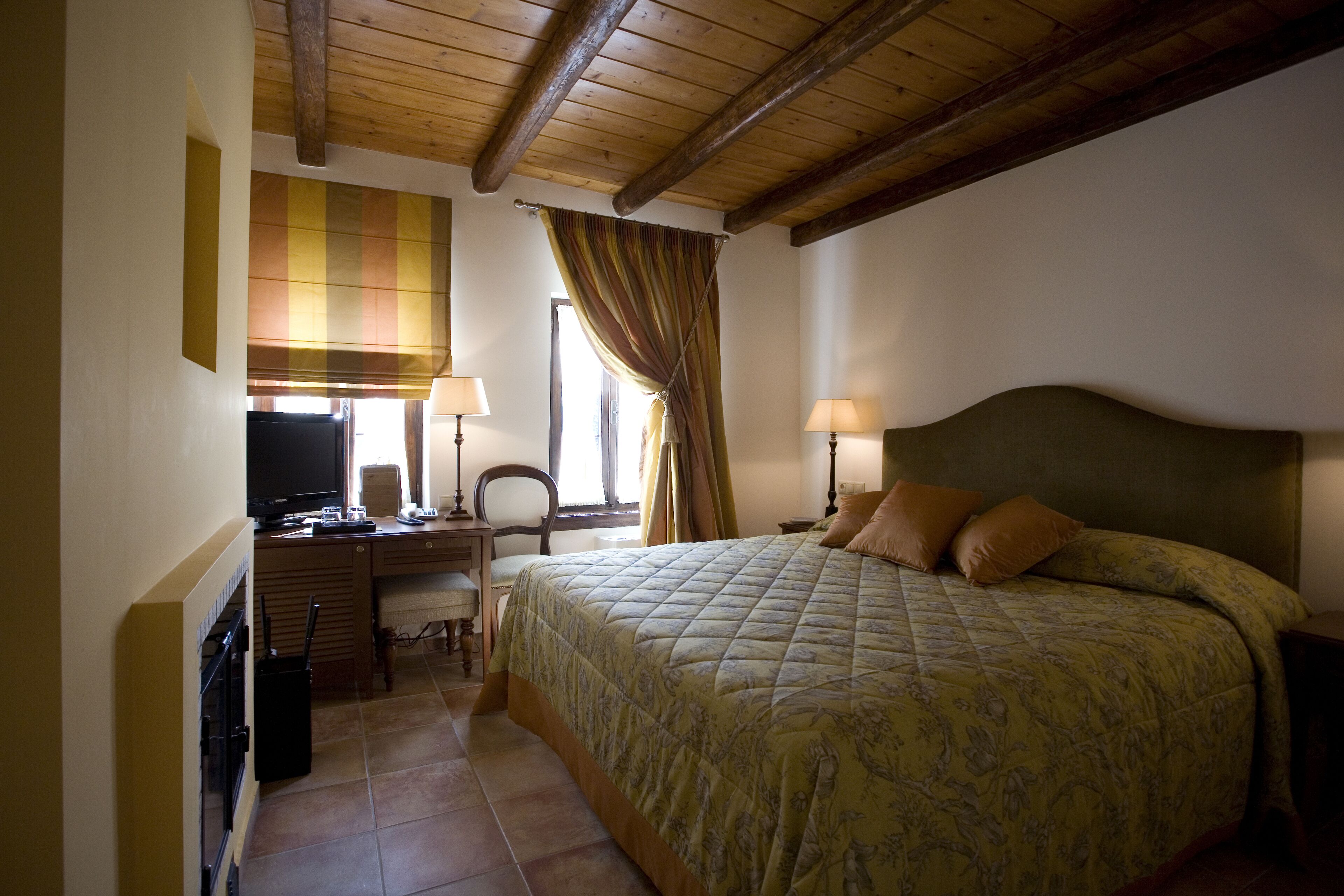 standard room: mountain, village view | minibar, in-room safe, individually decorated, desk