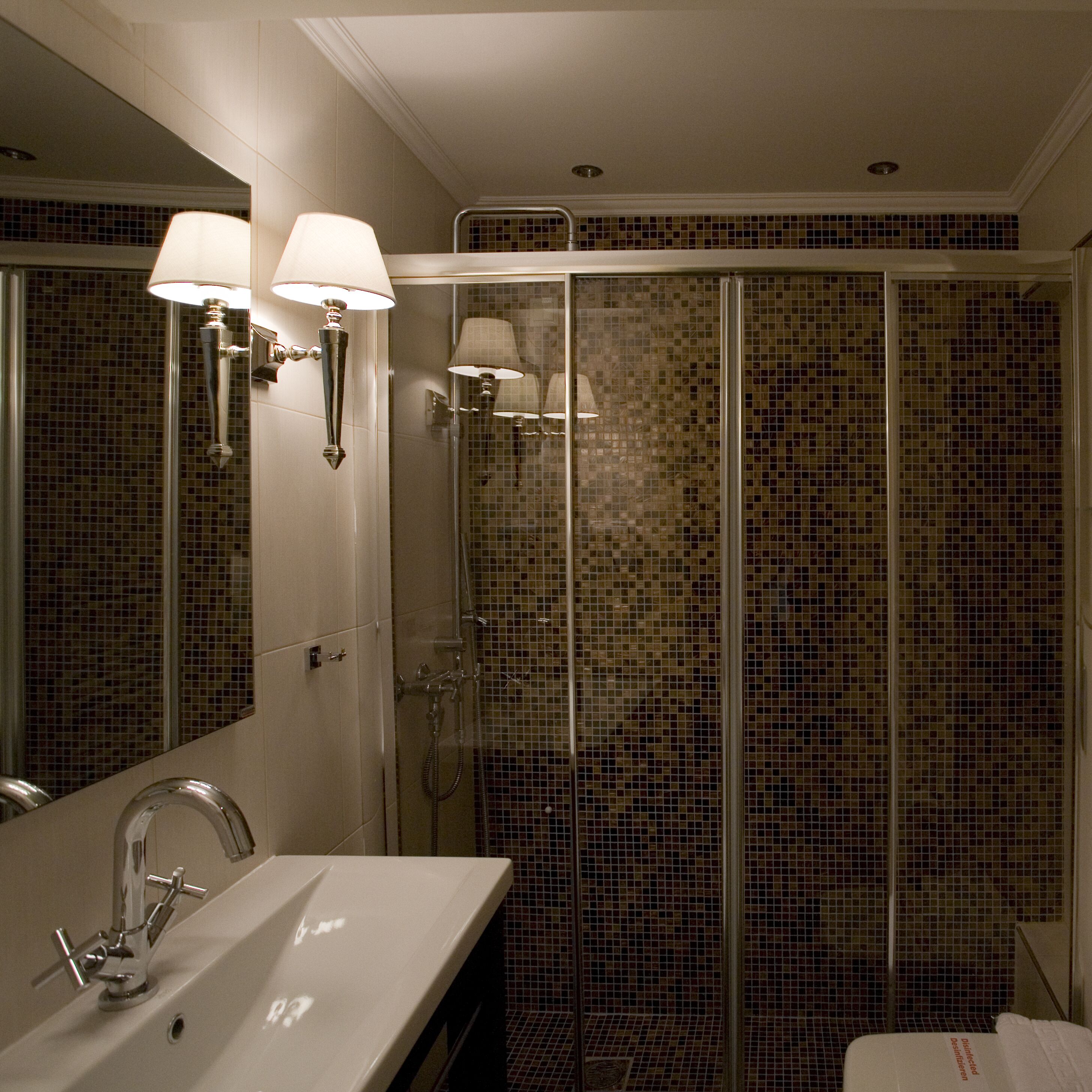 standard double room single use | bathroom | rainfall showerhead, free toiletries, hair dryer, bathrobes