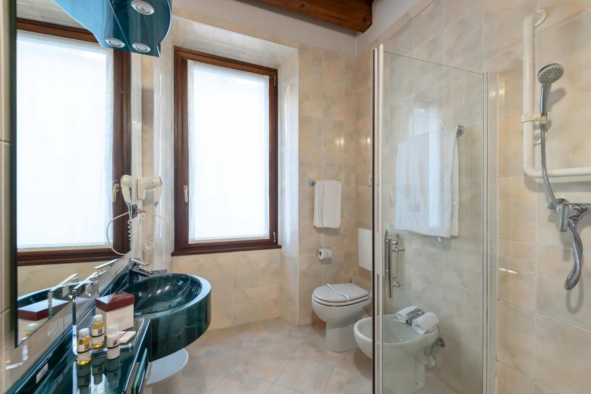 hair dryer, bidet, towels