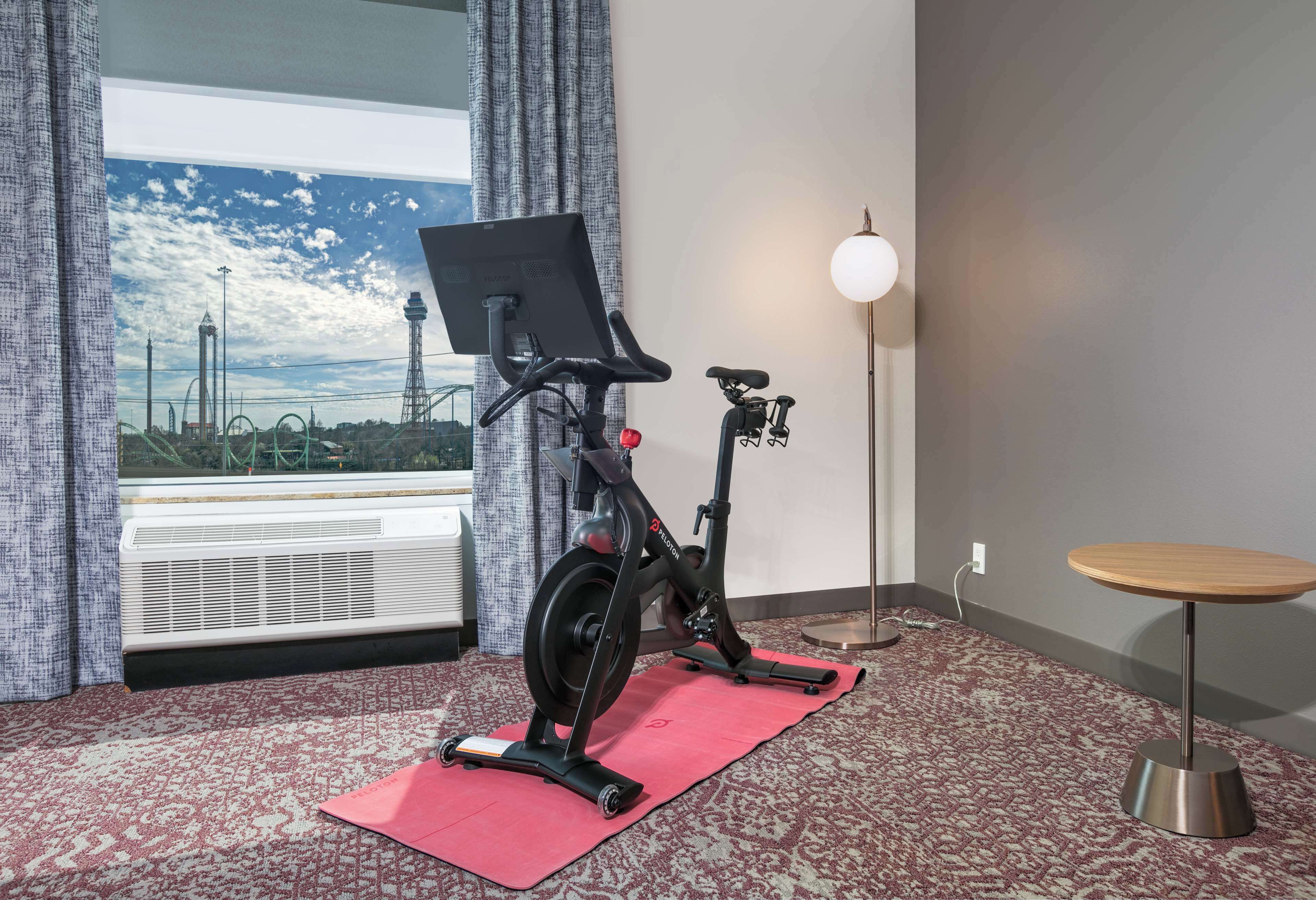 desk, laptop workspace, blackout curtains, iron/ironing board