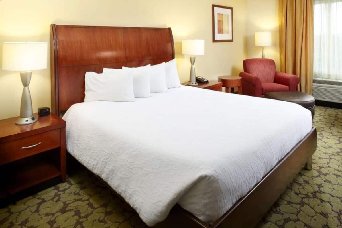 Desk, laptop workspace, blackout curtains, iron/ironing board