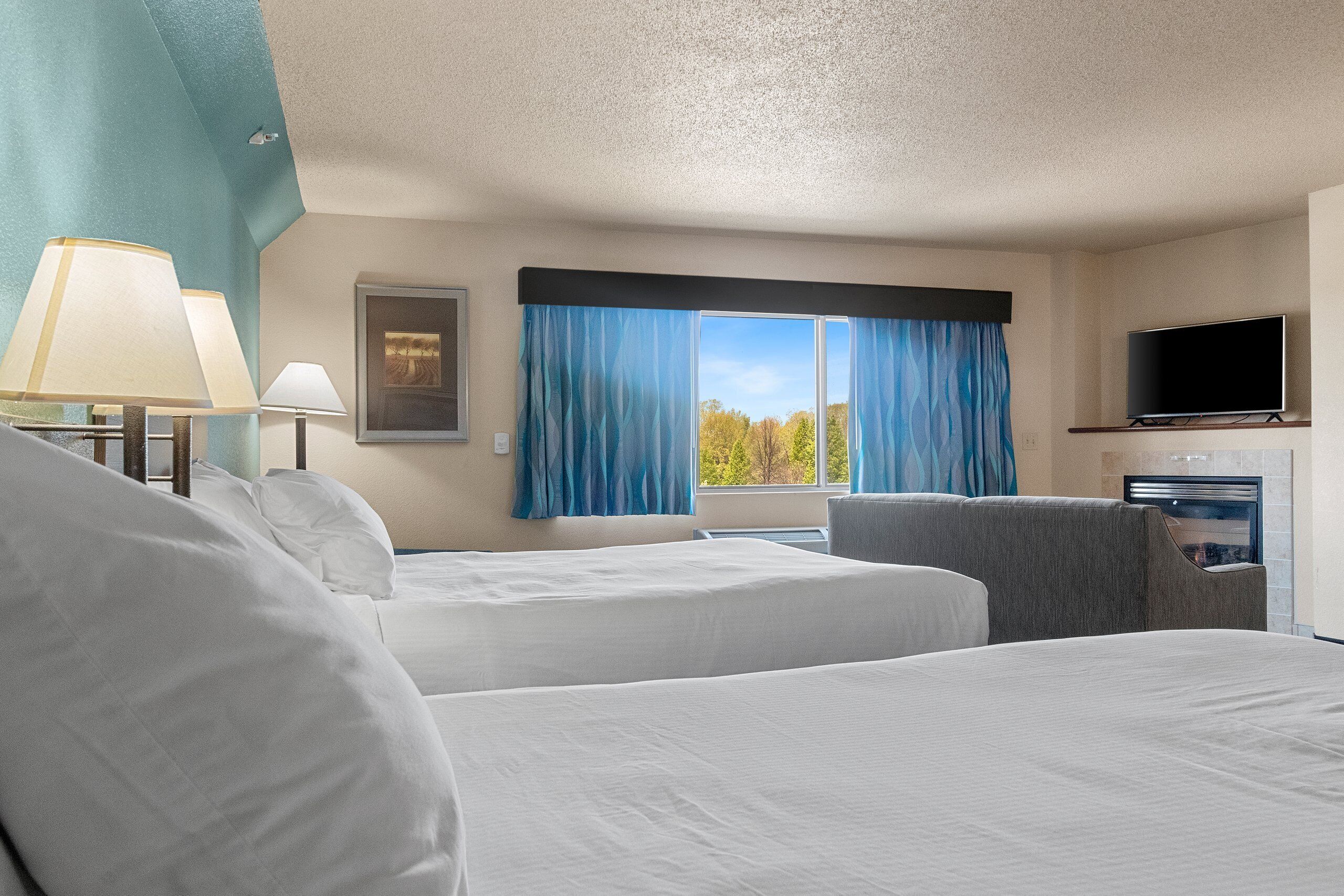 studio suite, 2 queen beds, non smoking | desk, iron/ironing board, free cots/infant beds, rollaway beds