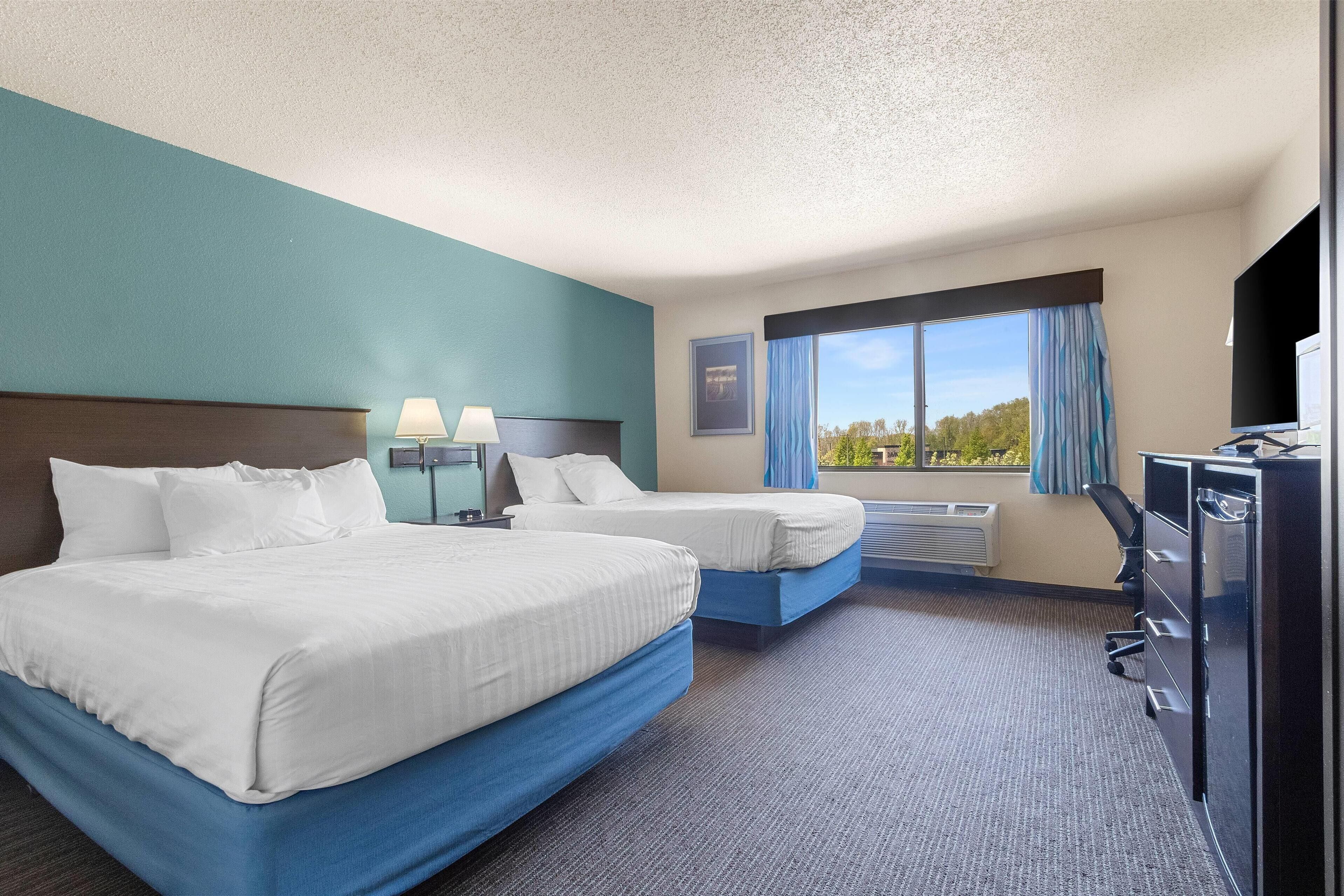 Deluxe Room, 2 Queen Beds, Non Smoking | Desk, iron/ironing board, free cots/infant beds, rollaway beds