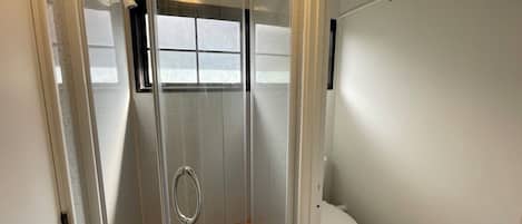 Shower, free toiletries, hair dryer, towels
