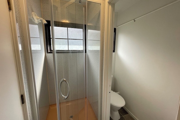 Shower, free toiletries, hair dryer, towels