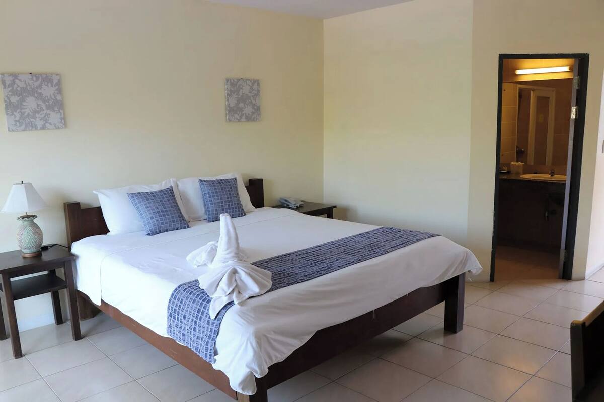 Superior Double Room, Garden View | Desk, blackout drapes, rollaway beds, bed sheets