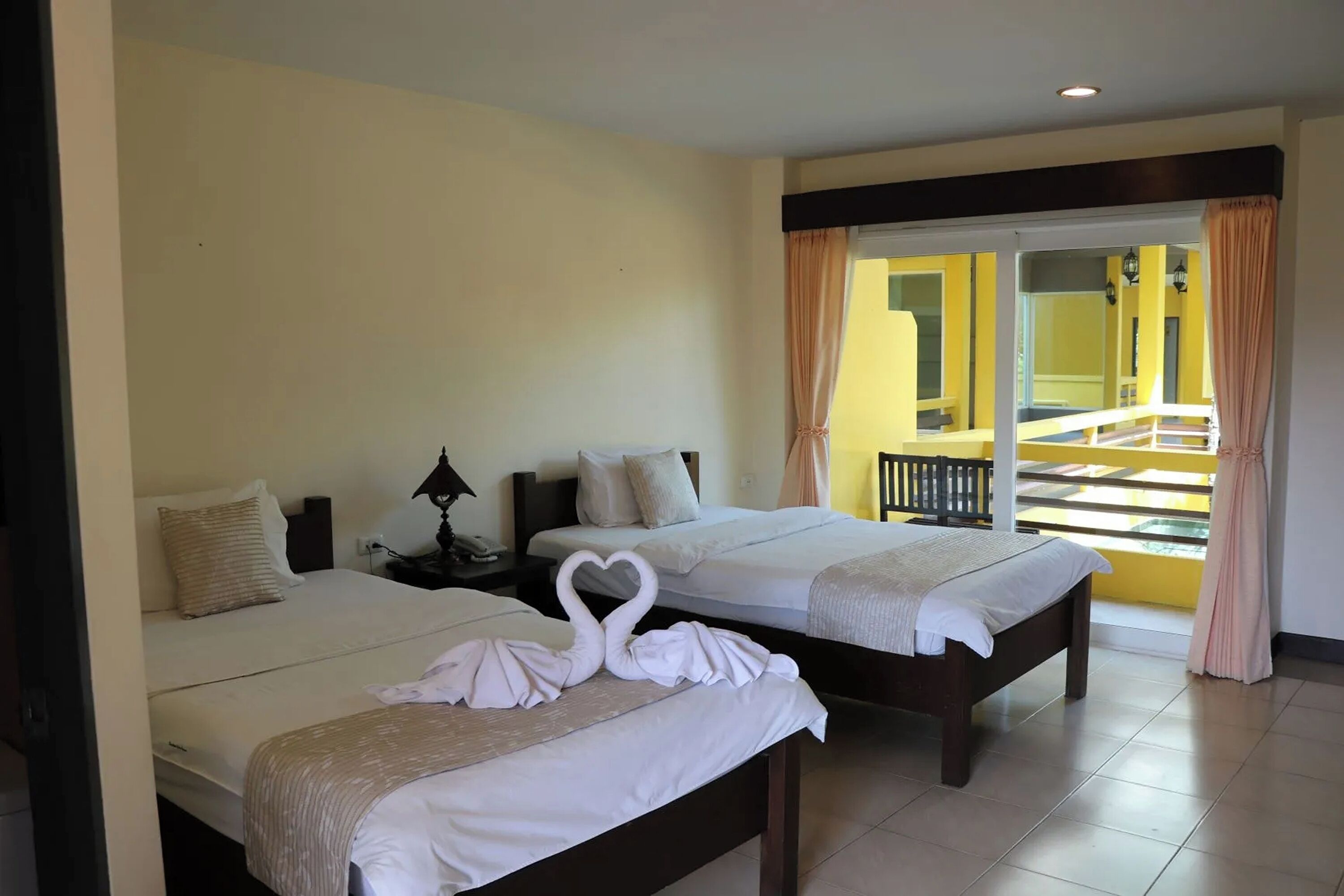 Desk, blackout drapes, rollaway beds, bed sheets