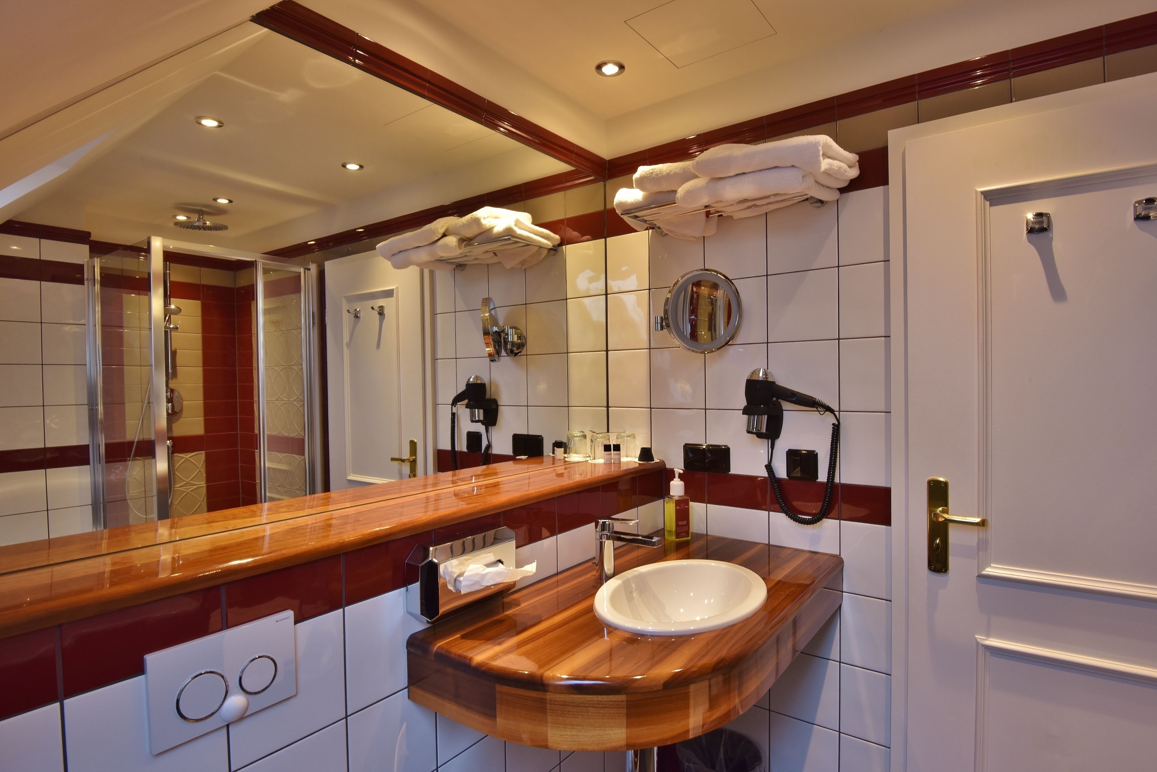 premium room | bathroom | hair dryer, towels, soap, shampoo