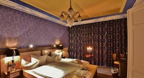 Premium Room | Minibar, in-room safe, individually decorated, desk